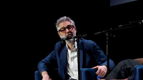 Ira Glass being interviewed on a stage at the Tribeca Festival